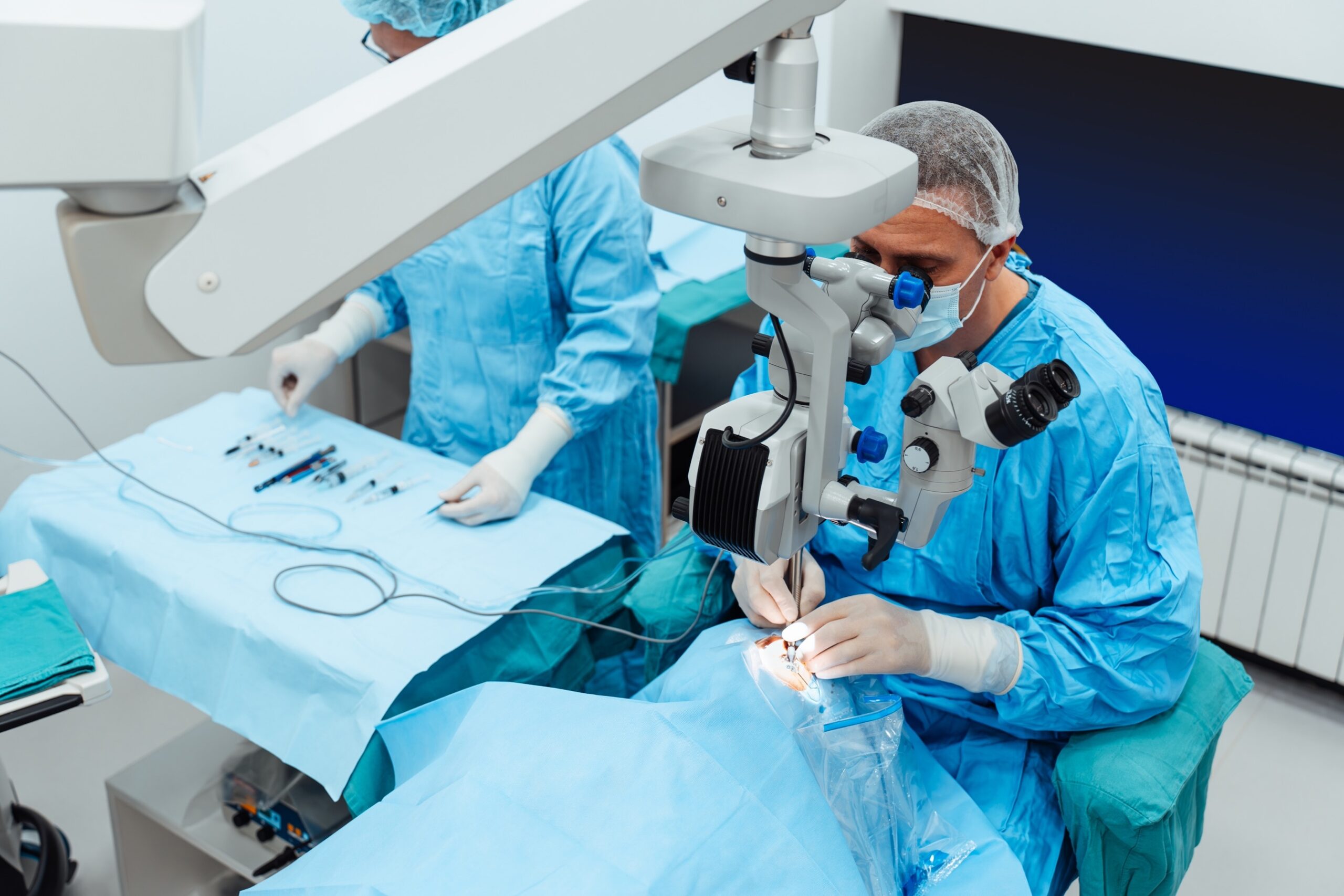 Surgeon and team performing eye surgery on a patient