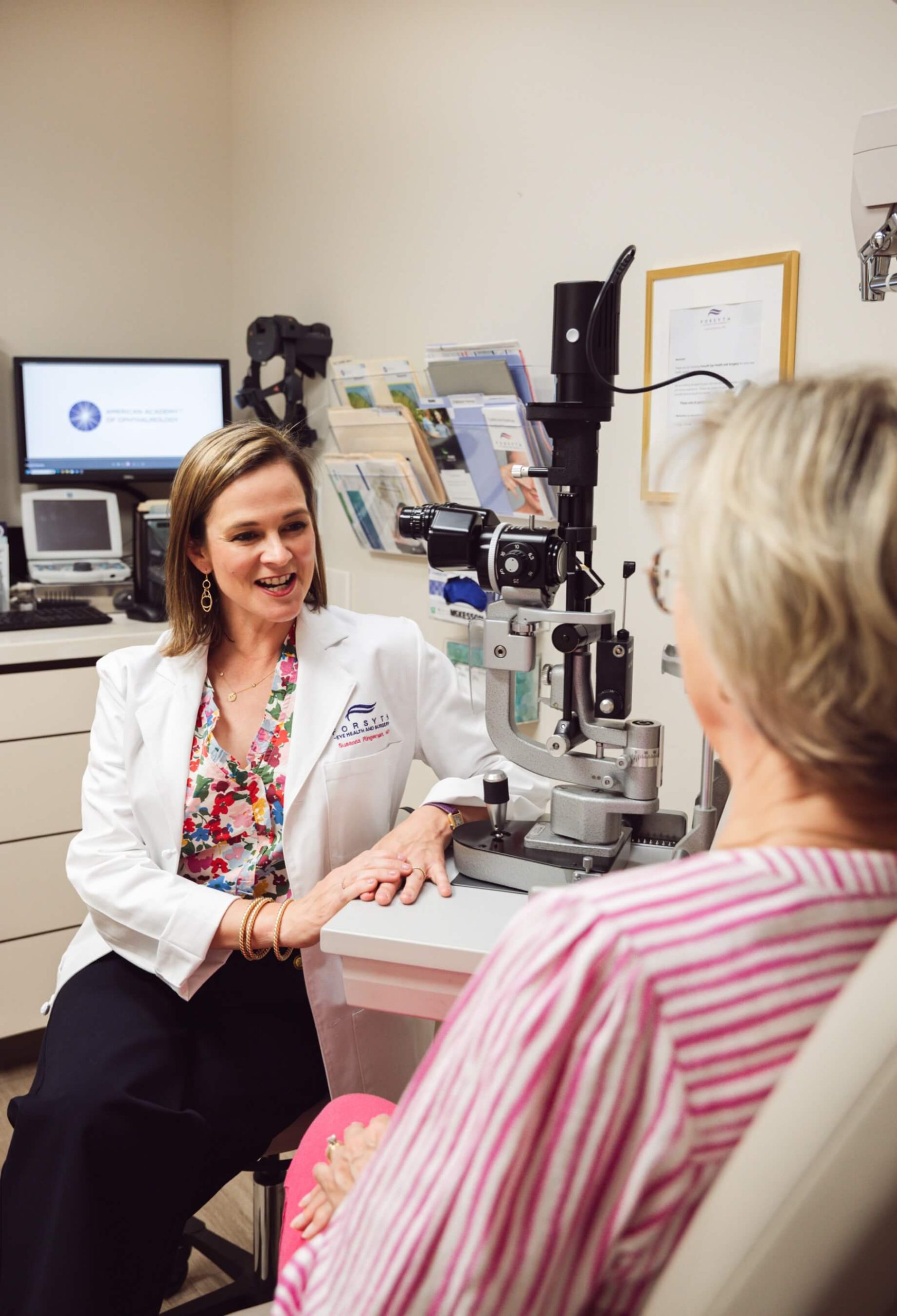Forsyth Eye Health ophthalmologist examining a patient at the slit lamp