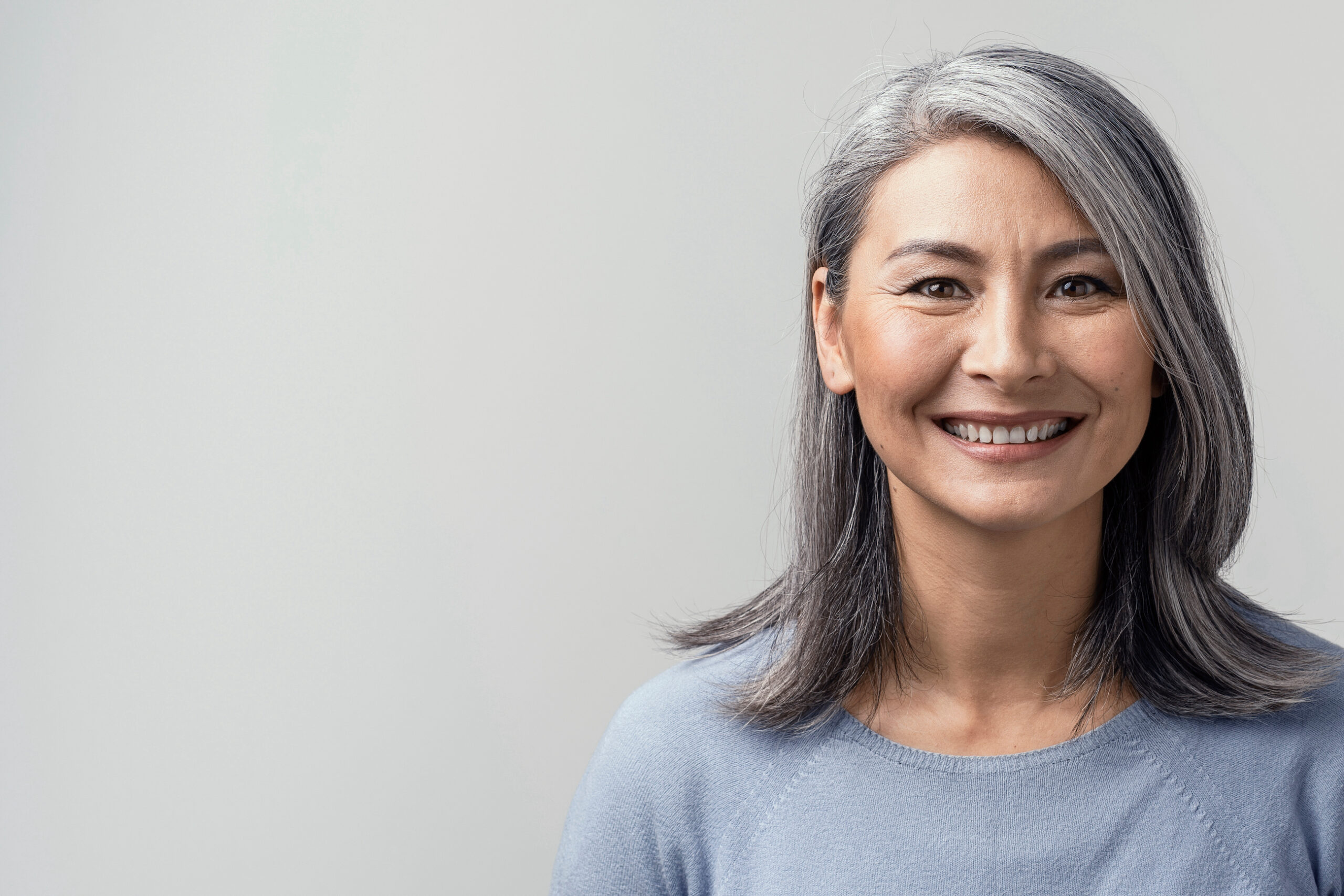 Close-up portrait of a smiling mature woman